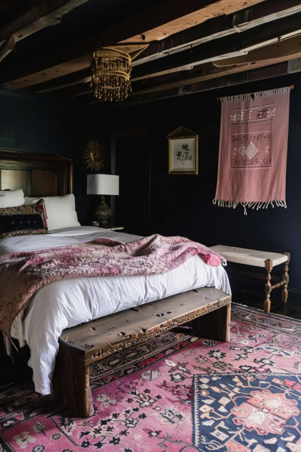 Navy and pink boho bedroom with rustic and eclectic elements.